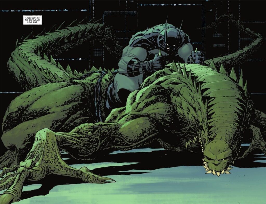 Página interna de Absolute Batman divulgada pela DC: o Batman, de armadura com espinhos, monta sobre um enorme crocodilo mutante verde num galpão escuro