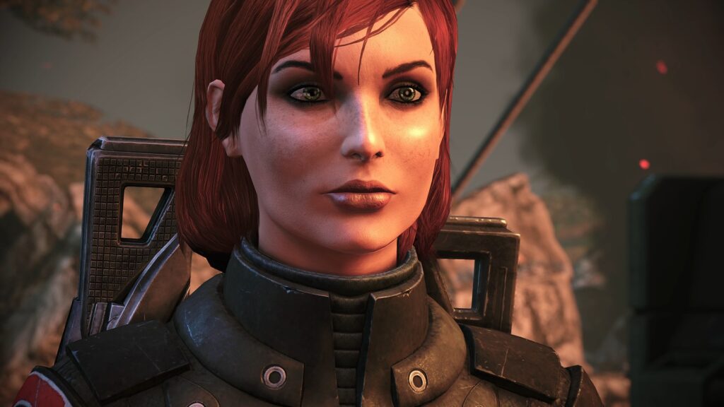 Close da Comandante Shepard, de cabelo ruivo e armadura N7, numa cena de diálogo de Mass Effect Legendary Edition