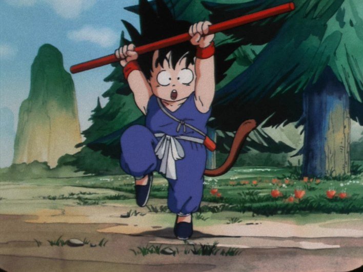 Goku criança com o Bastão Mágico no primeiro episódio de Dragon Ball, quando conhece Bulma