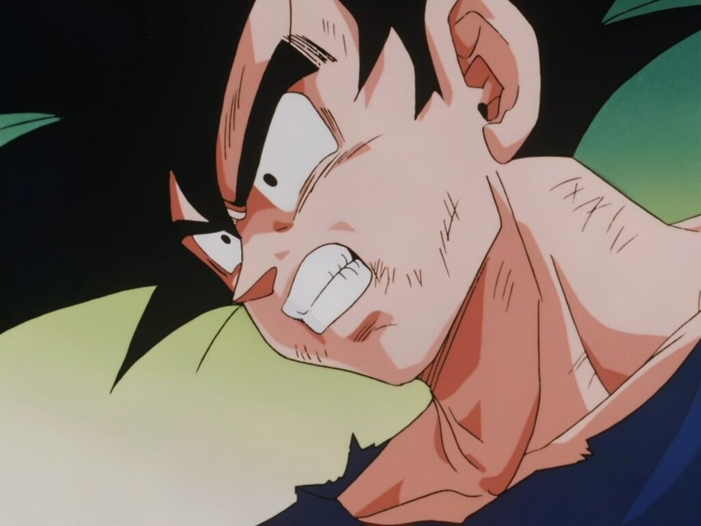 Goku, ainda de cabelo preto, cerra os dentes de raiva em Namekusei no episódio 95 de Dragon Ball Z