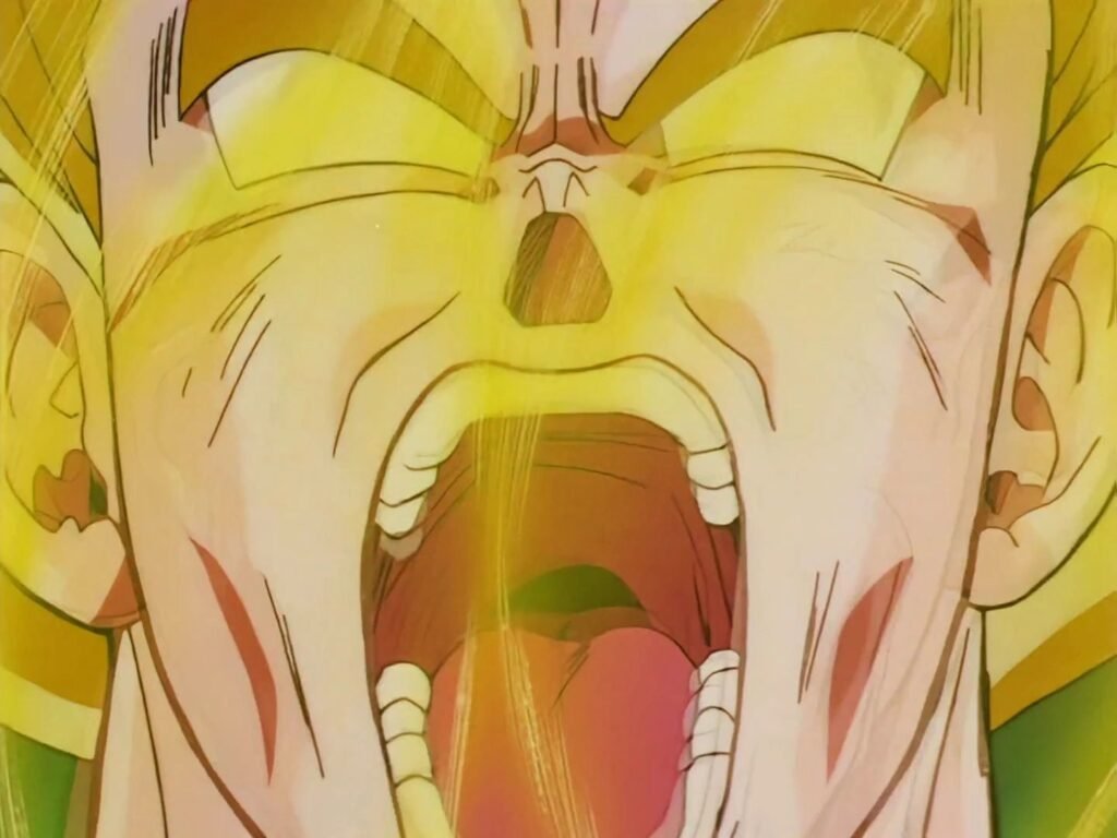 Goku grita envolto em luz dourada ao se transformar em Super Saiyajin pela primeira vez