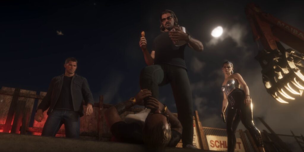 Cena oficial do trailer de lançamento de GTA 6: Raul Bautista, de óculos escuros, come frango com o pé sobre um homem caído num canteiro de obras à noite, com Jason à esquerda