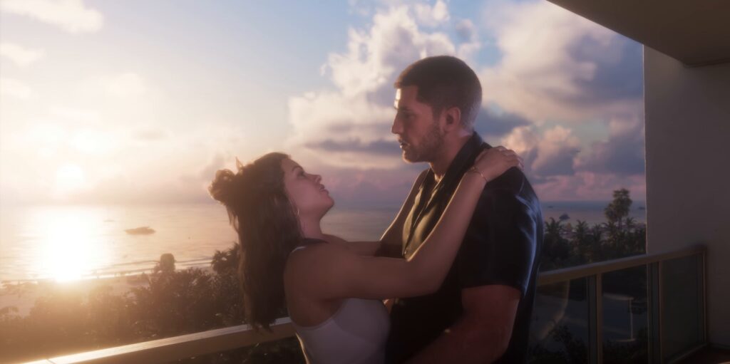 Cena oficial do trailer de lançamento de GTA 6: Jason e Lucia abraçados numa varanda de frente para o mar, ao pôr do sol