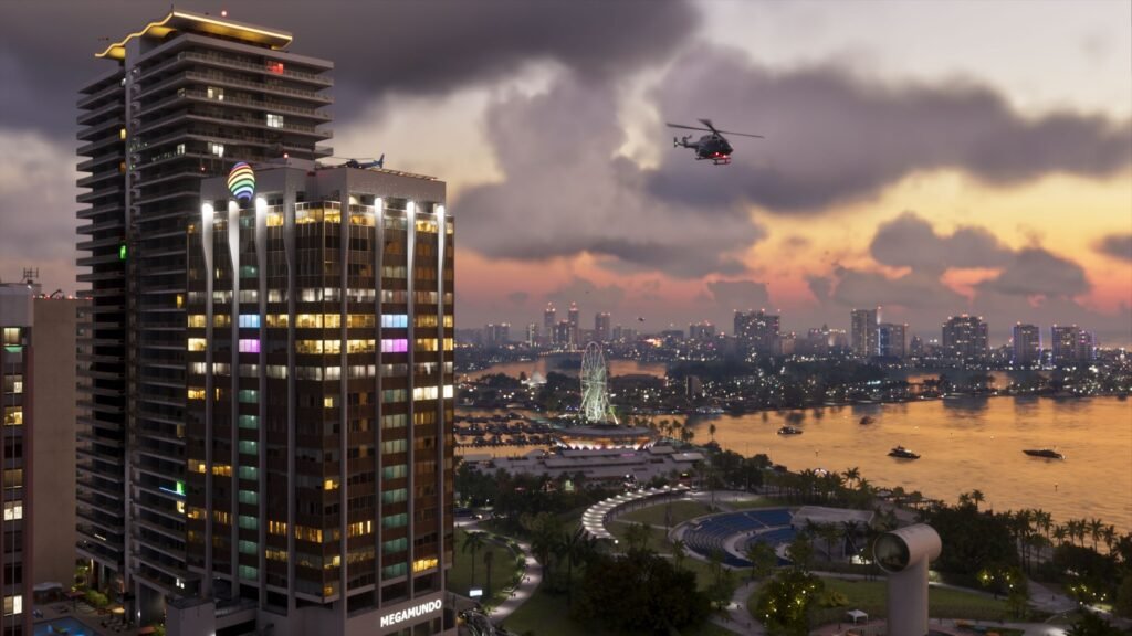 Vista aérea de Vice City no fim de tarde, com arranha-céus, a baía e um helicóptero no céu, em captura oficial de GTA VI