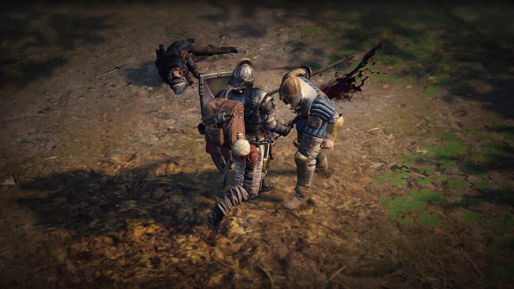 Dois mercenários de armadura lutam corpo a corpo numa clareira, com um inimigo caído ao fundo, em cena oficial de Wartales