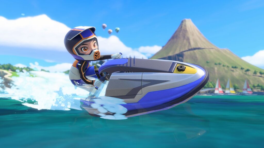 Sportsmate de capacete azul pilota um jet ski na água turquesa da Ilha Wuhu, com o vulcão Maka Wuhu ao fundo