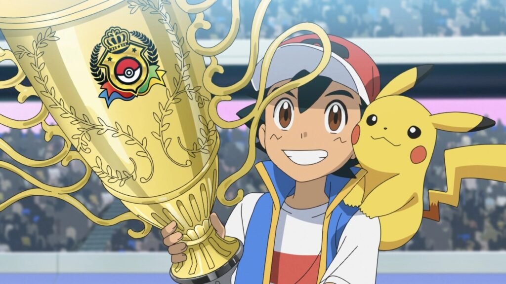 Ash e Pikachu com o troféu do Campeonato Mundial de Coroação em Pokémon Jornadas Supremas