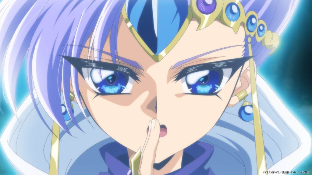 Close do mago Clef, de cabelo lilás e tiara dourada, em cena oficial do episódio 1 do novo anime de Rayearth