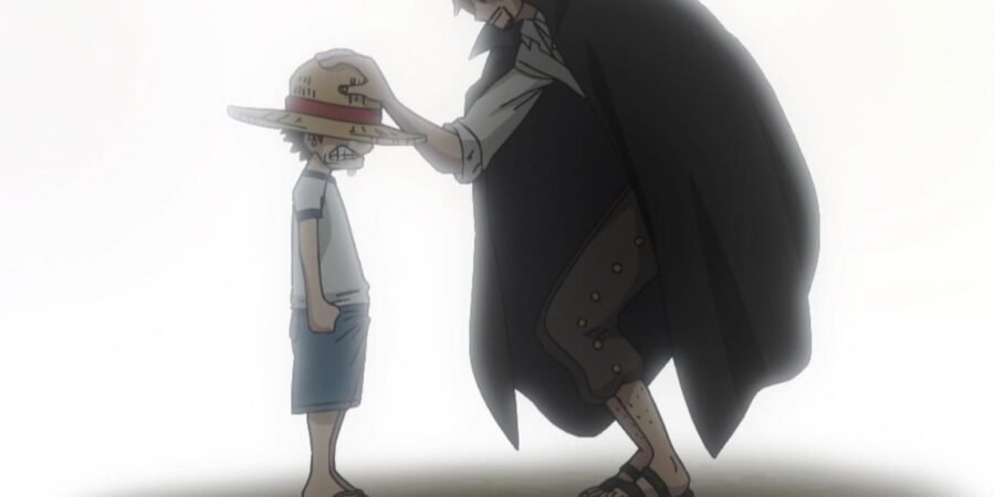 Shanks coloca o chapéu de palha na cabeça do pequeno Luffy (Romance Dawn; Episode of East Blue)